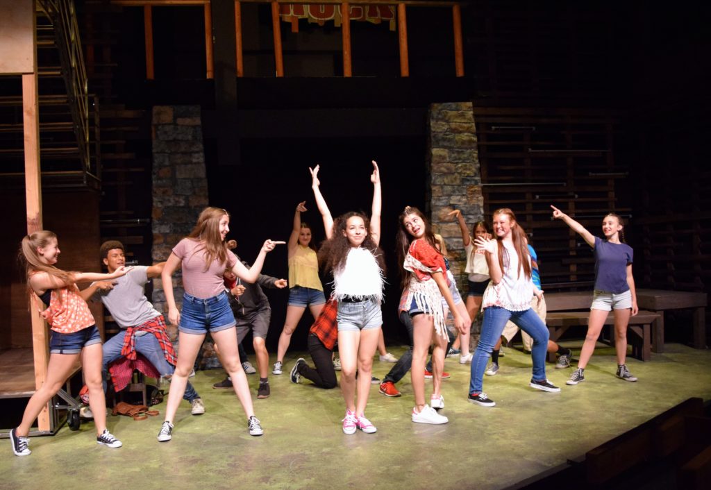 Zoë Reed and the cast of Camp Rock. Photo Credit: Ryan Luevano. 